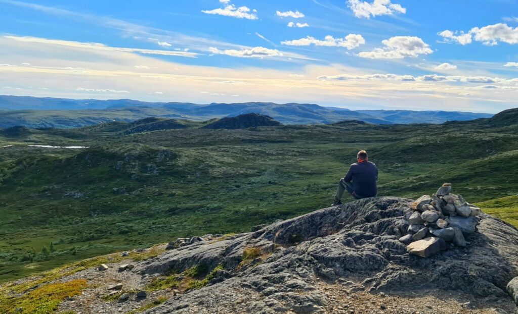 Panoramic views over Hardangervidda from the summit of the mountain hike Dagali
