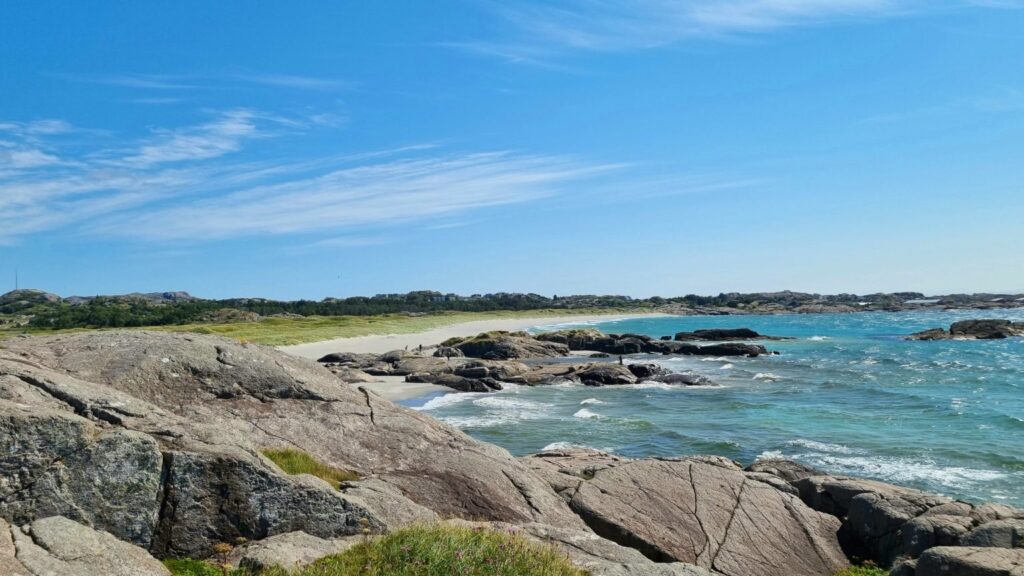 Ogna Beach stretches out in golden silence.
