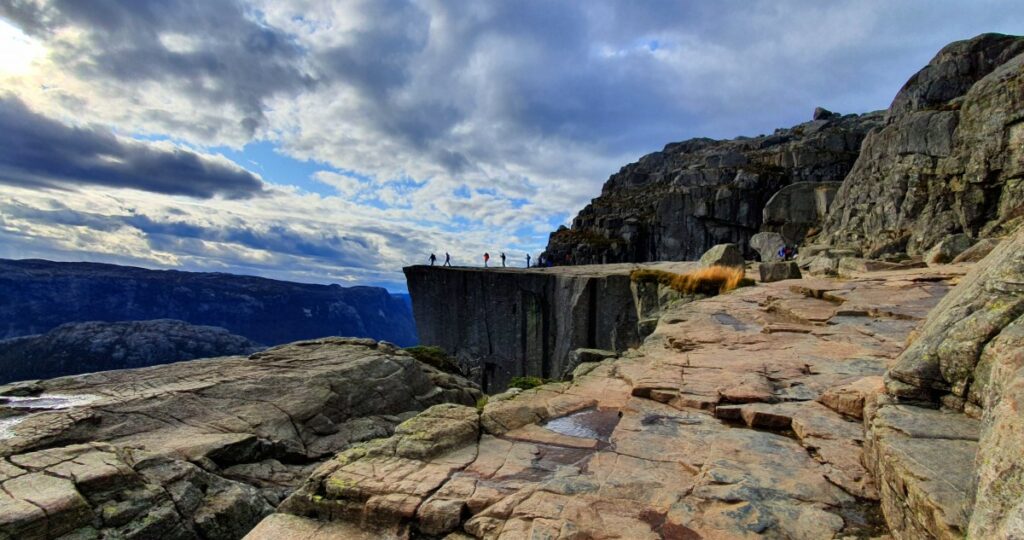 Adventurers enjoying the unforgettable view at Pulpit Rock Hike