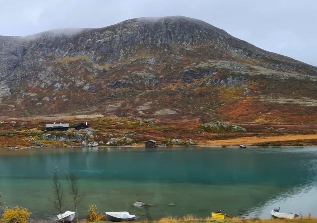 Autumn road trip in Norway with colorful mountains